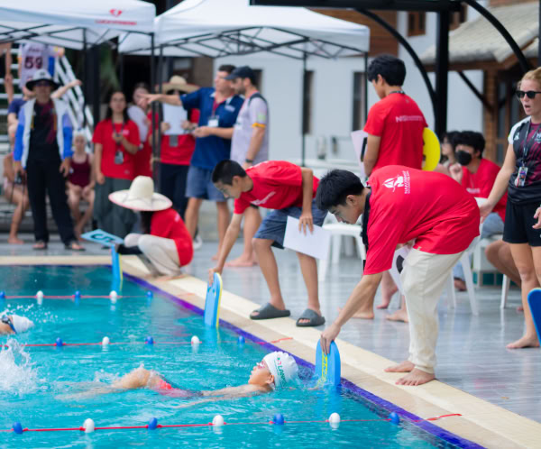 A happy family gathers in the kitchen to prepare a delicious meal together, fostering togetherness and joy.